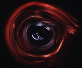black hole effect in online counselling Black hole effect in online counselling - Photo of a circular swirl of red against a dark background
